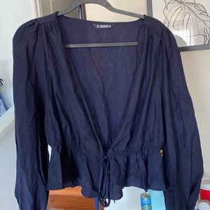 navy blue cross and tie blouse